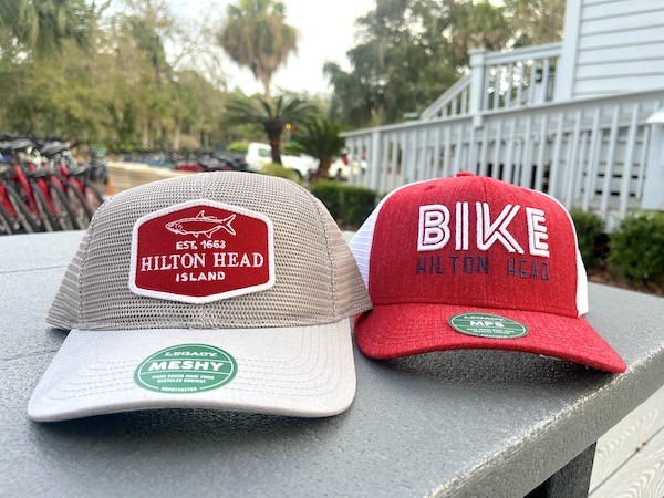 tan and red Hilton Head Island hats on display outside of Hilton Head Outfitters