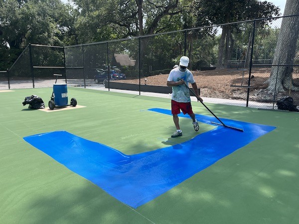 pickleball courts rebuild with blue paint