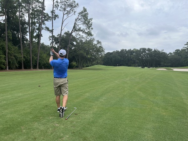 golfer post swing during lessons at Palmetto Dunes