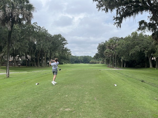 golfer post swing during lessons at Palmetto Dunes