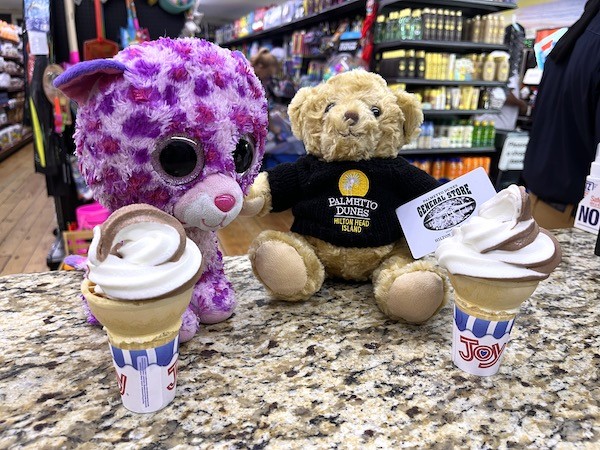 Purple the Cat and Palmetto Dunes Teddy having ice cream cones at the General Store