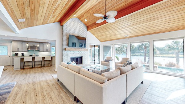 open and airy living room with wooden raised ceilings of Palmetto Dunes Vacation Rental