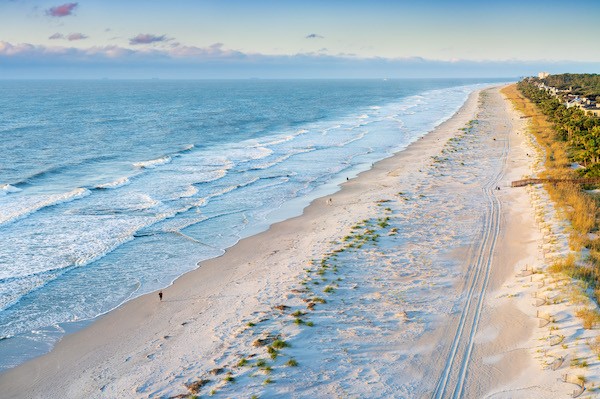 aerial view of the empty beach and ocean in the morning at Palmetto Dunes