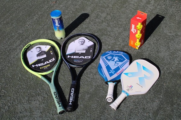 Head tennis rackets and Pickleball rackets displayed on the court