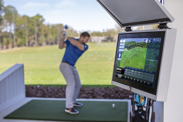 Hitting ball at Toptracer Range