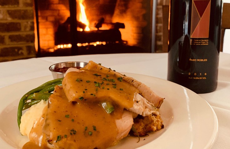 Thanksgiving dinner by the fireplace at Alexander's Restaurant