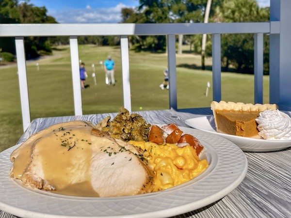 sliced turkey breast with gravy and sides at Big Jim's thanksgiving to go event