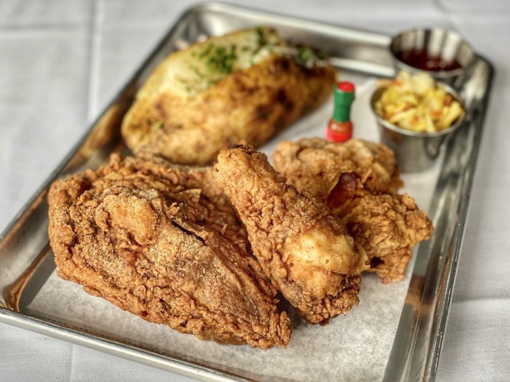 fried chicken platter with baked potatoe at Big Jim's