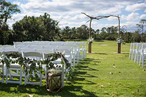 ceremony aisle and arch setup on Hills golf course
