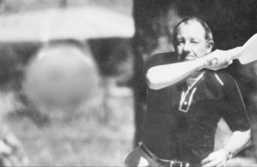 Barney McCallum black and white photo swinging pickleball paddle