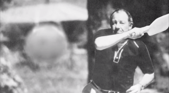 Barney McCallum black and white photo swinging pickleball paddle