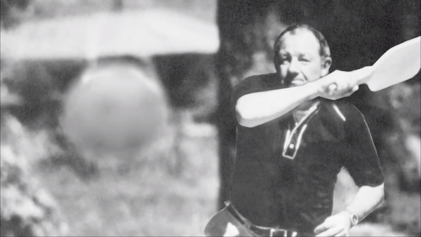 Barney McCallum black and white photo swinging pickleball paddle
