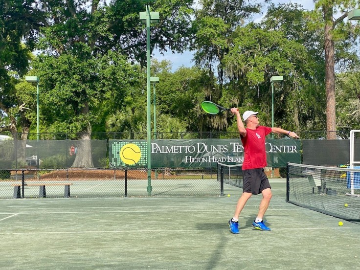 tennis player in action on the Palmetto Dunes Tennis courts