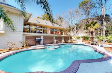 private pool and spa with deck area of a Palmetto Dunes Vacation Rental