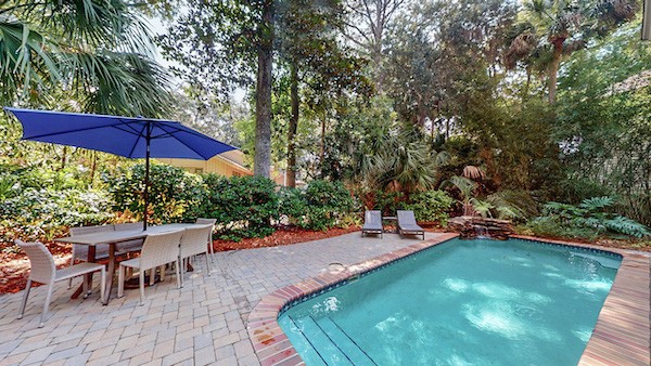 private pool in the backyard of a Palmetto Dunes vacation home