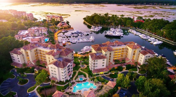 Aerial view of Shelter Cove Marina during sunset