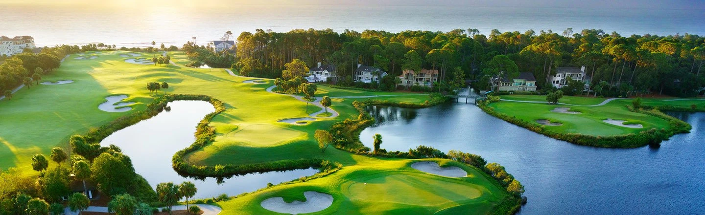 sunrise over the ocean at the robert trent jones course